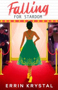 Cover of Falling for Stardom. Illustration of a woman walking down a red carpet toward a movie theater as cameras flash.